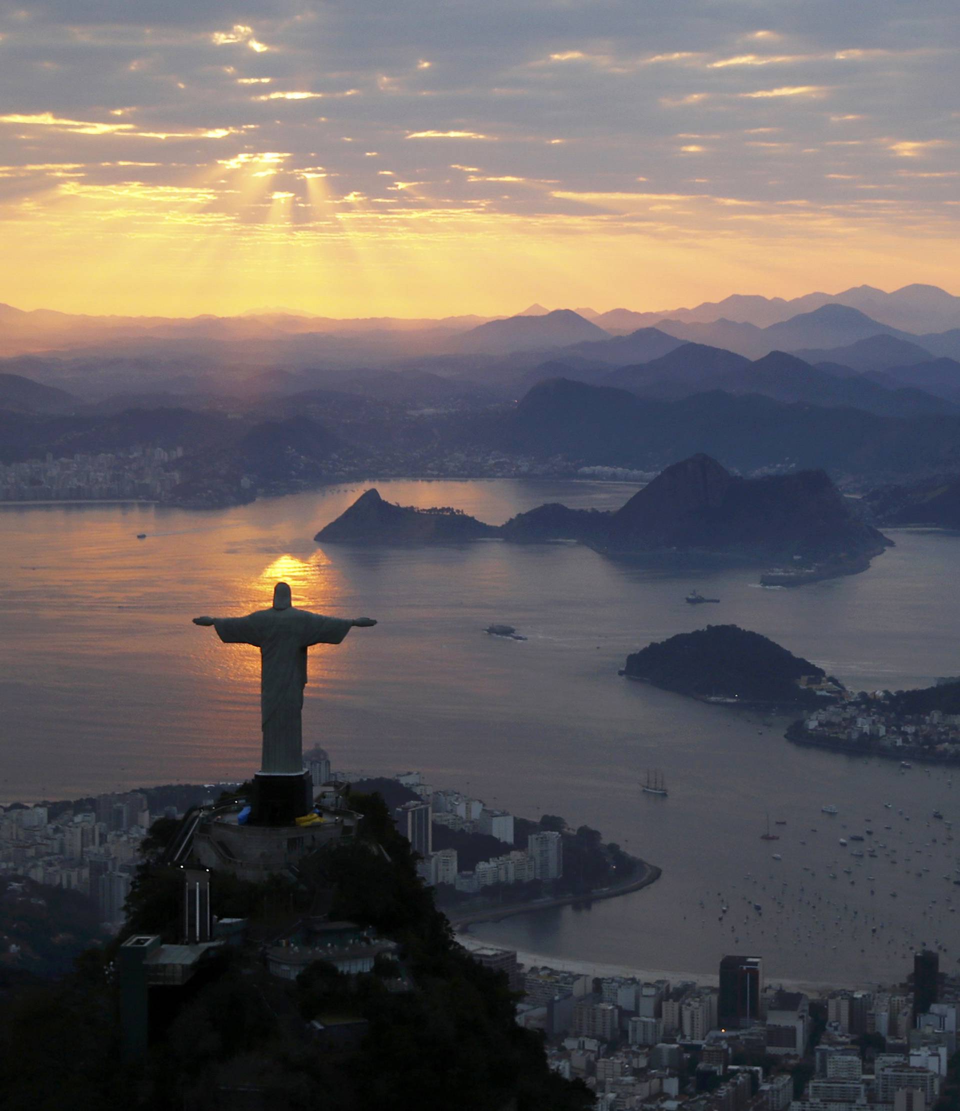 Jesus Christ The Redeemer is seen during sunrise in Rio de Janeiro