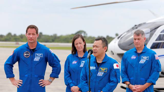 Astronauts arrive before launch to the International Space Station, in Cape Canaveral