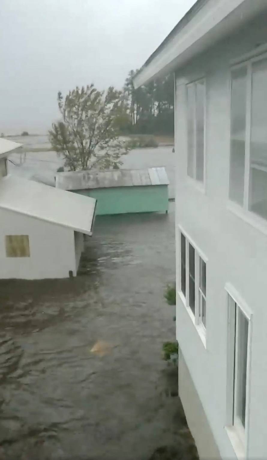 Flood waters are seen in Belhaven, North Carolina, in this still image from video obtained from social media