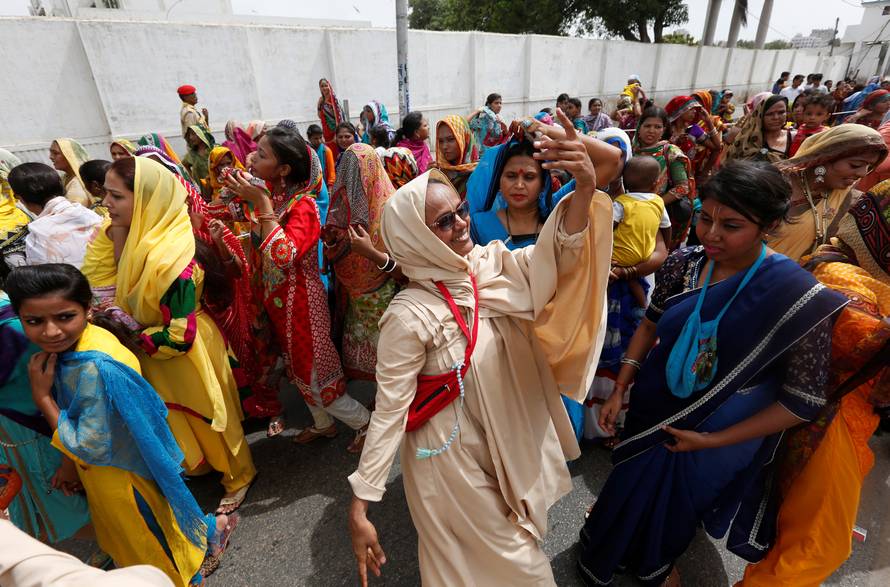A Hindu devotee dances during the Rath Yatra, or chariot procession in Karachi