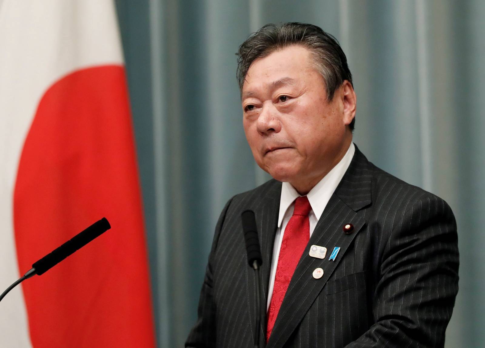 FILE PHOTO : Japan's Olympic Minister Yoshitaka Sakurada attends a news conference in Tokyo