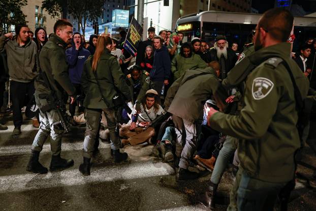 Israelis protest a ceasefire deal, in Jerusalem