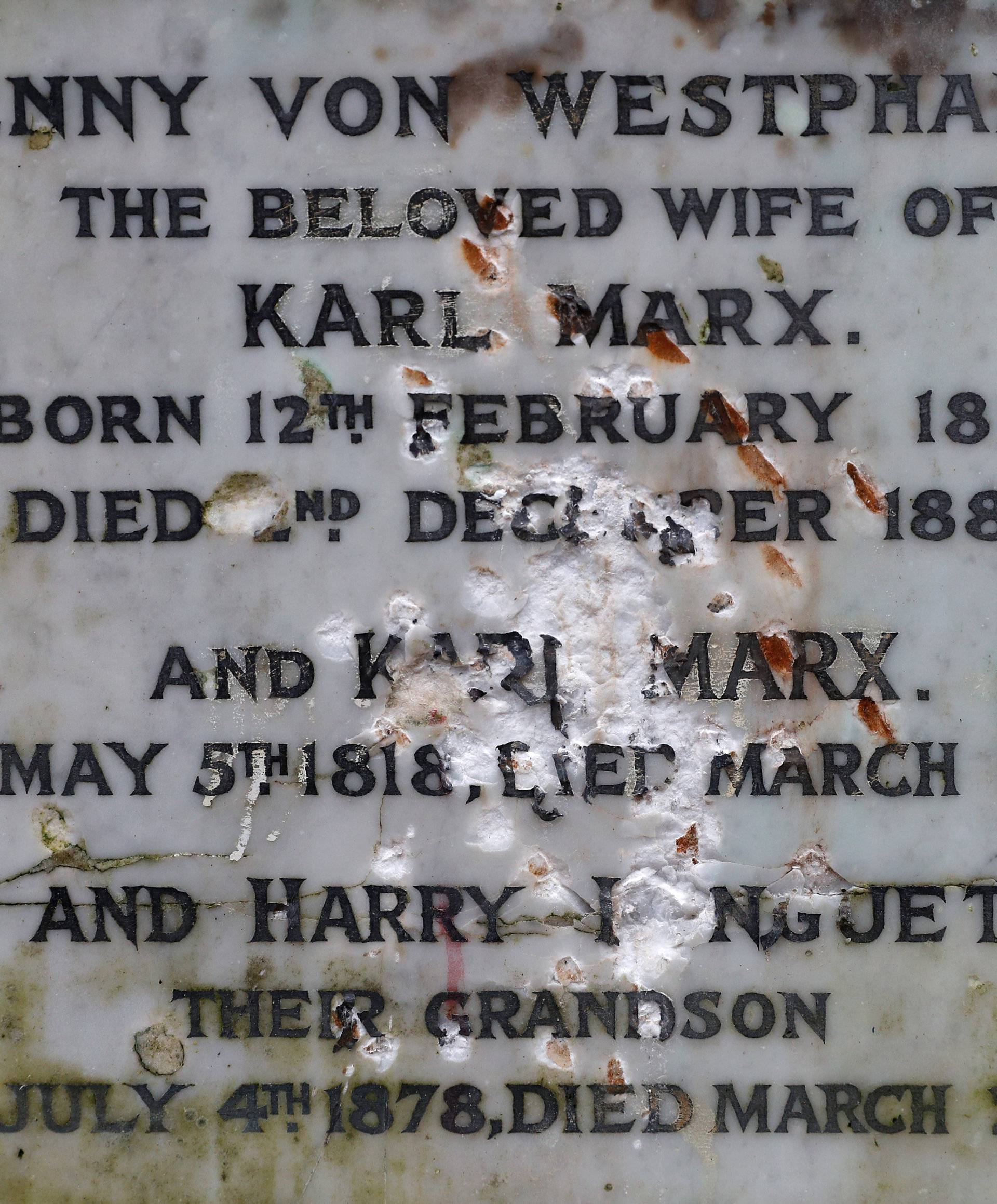 A memorial to German philosopher Karl Marx is seen after it was vandalised at Highgate Cemetery in north London