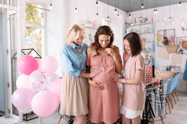 Pregnant,Sister.,Two,Businesswomen,Celebrating,Baby,Shower,Of,Their,Sister