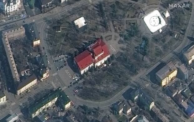 A satellite image shows Mariupol Drama Theatre before bombing