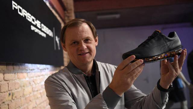 FILE PHOTO: Puma CEO Gulden displays shoe at collection launch in collaboration with Porsche Design in Berlin