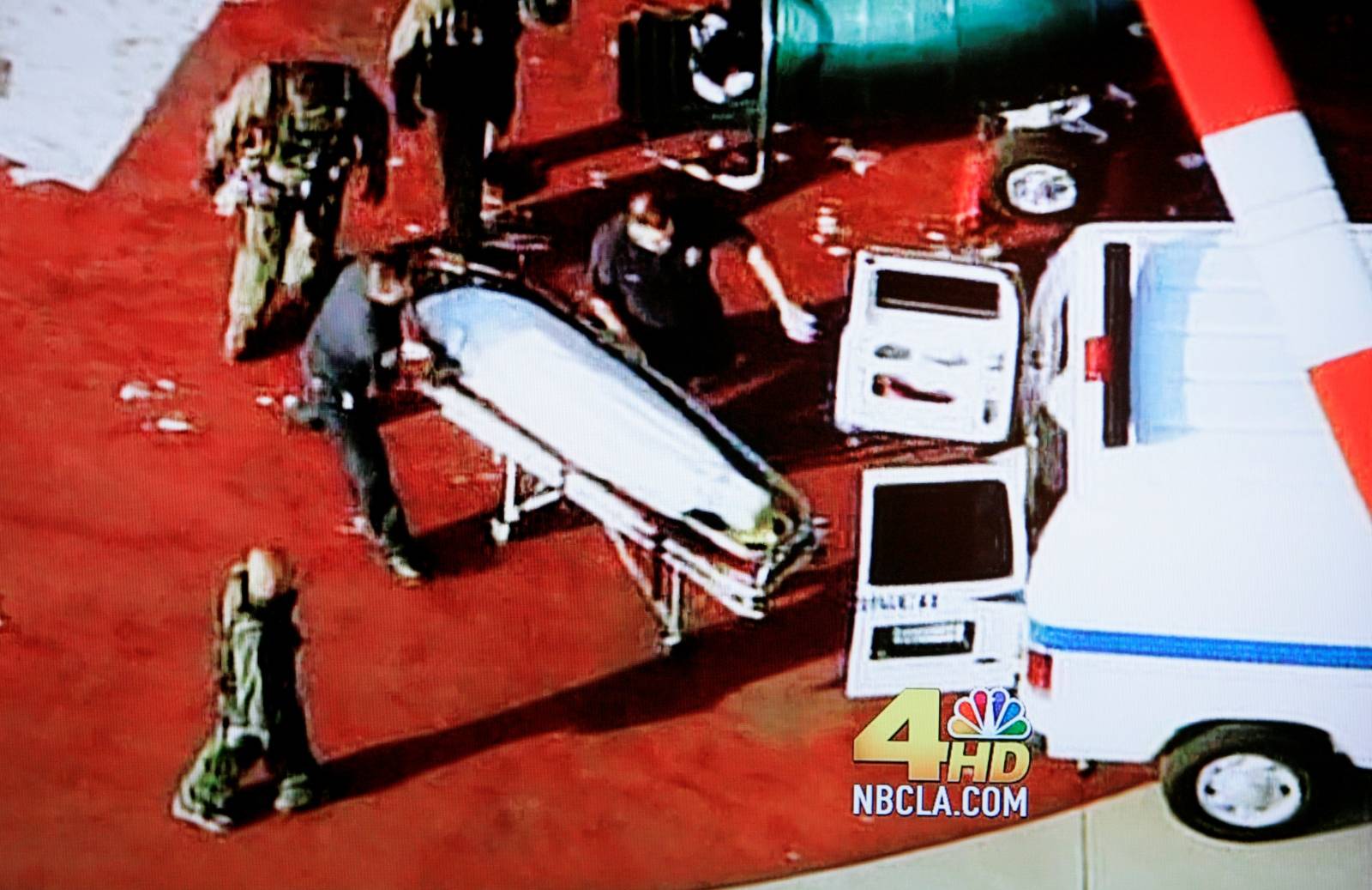 FILE PHOTO: Body of Michael Jackson is loaded into a coroner's van in Los Angeles