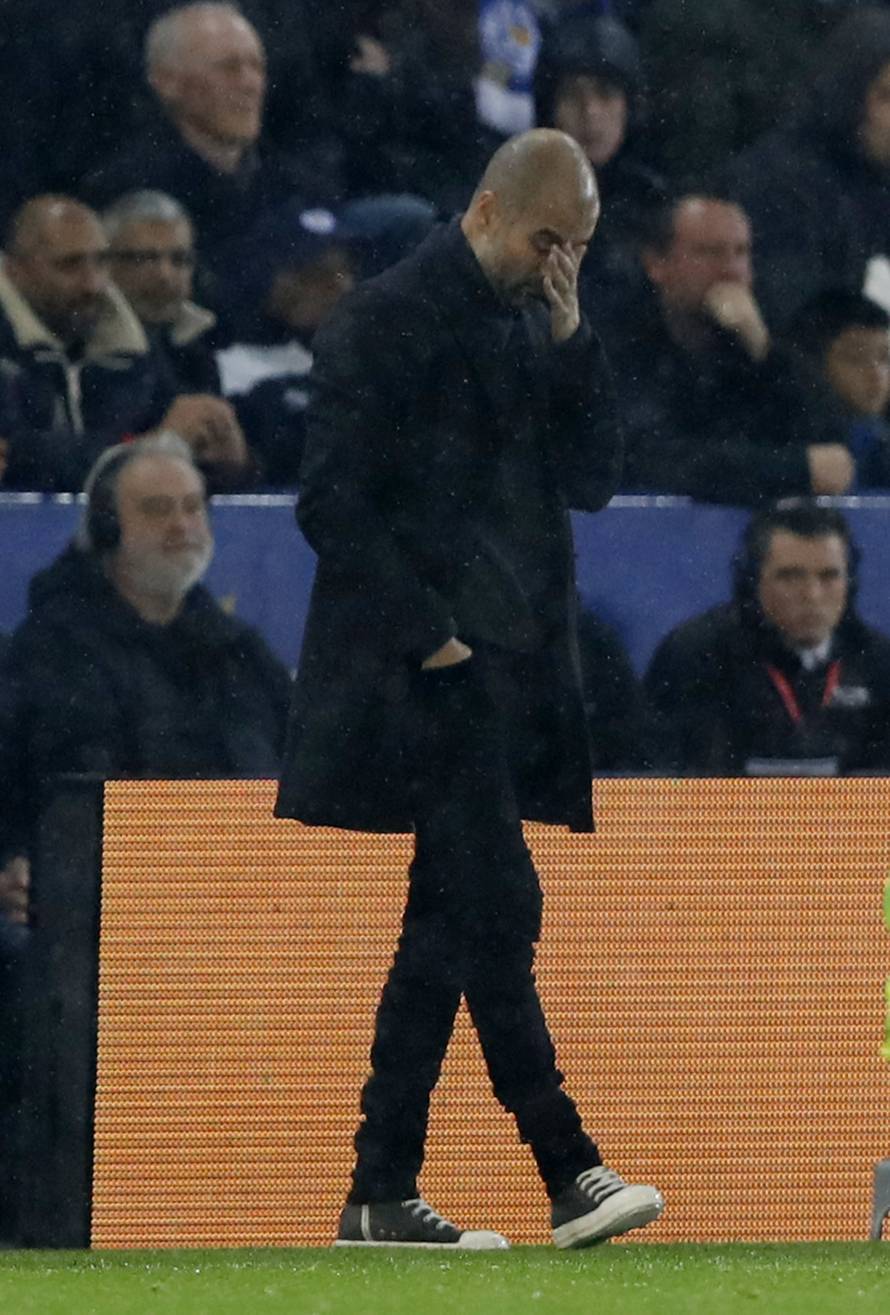 Manchester City manager Pep Guardiola looks dejected