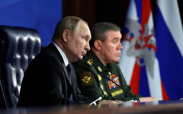 FILE PHOTO: Russian President Vladimir Putin attends a meeting of Defence Ministry Board in Moscow