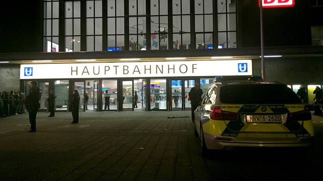 Police guard the entrance of the Duesseldorf main train station