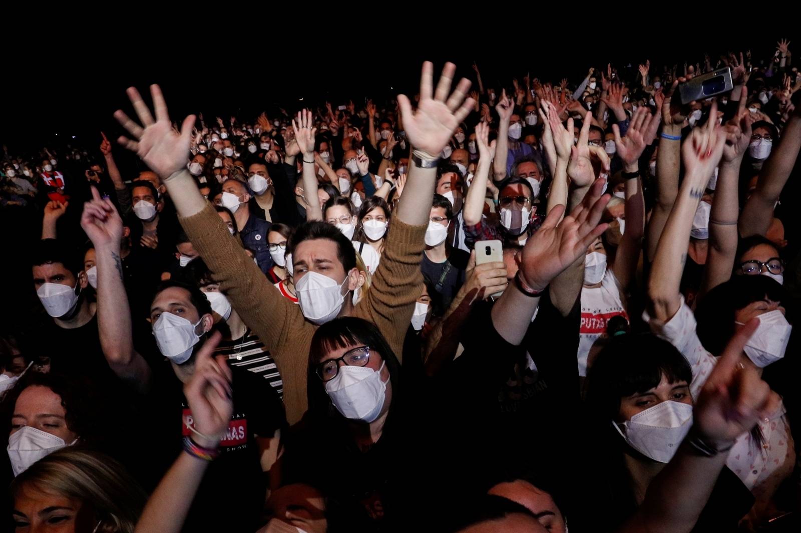 People attend first massive concert since the beginning of COVID-19 pandemic in Barcelona