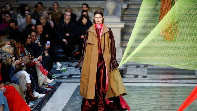 Models present creations during the Roksanda catwalk show at the Foreign & Commonwealth Office during London Fashion Week in London