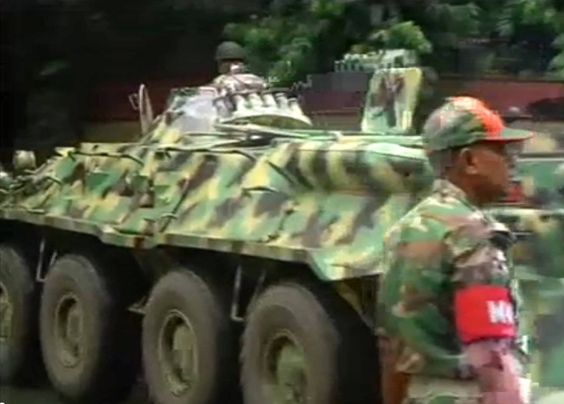 Still frame taken from video shows an army armoured vehicle moving along a street as police stormed the Holey Artisan restaurant after gunmen attacked it and took hostages early on Saturday in Dhaka