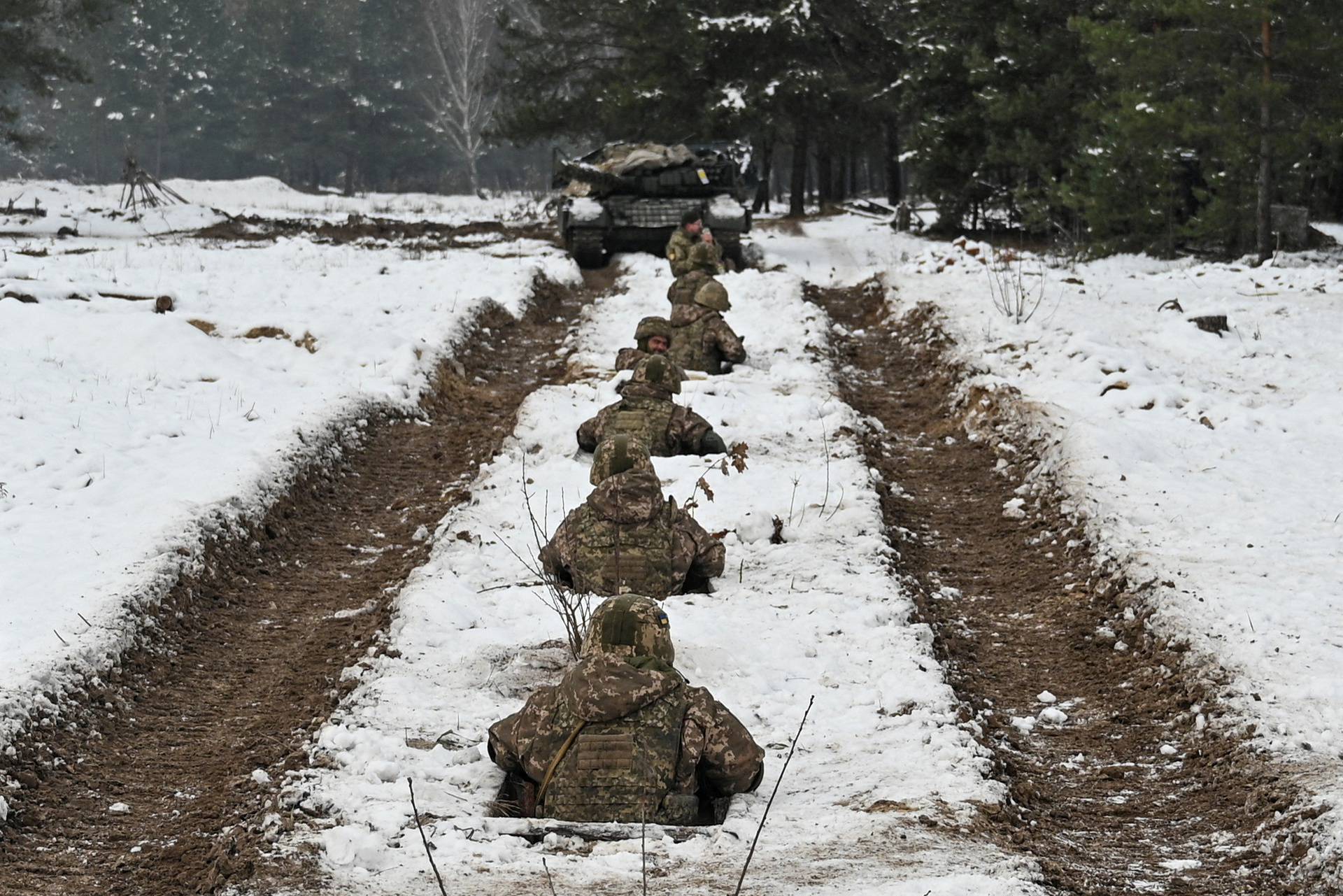 Ukrainian service members attend military exercises in Chernihiv region