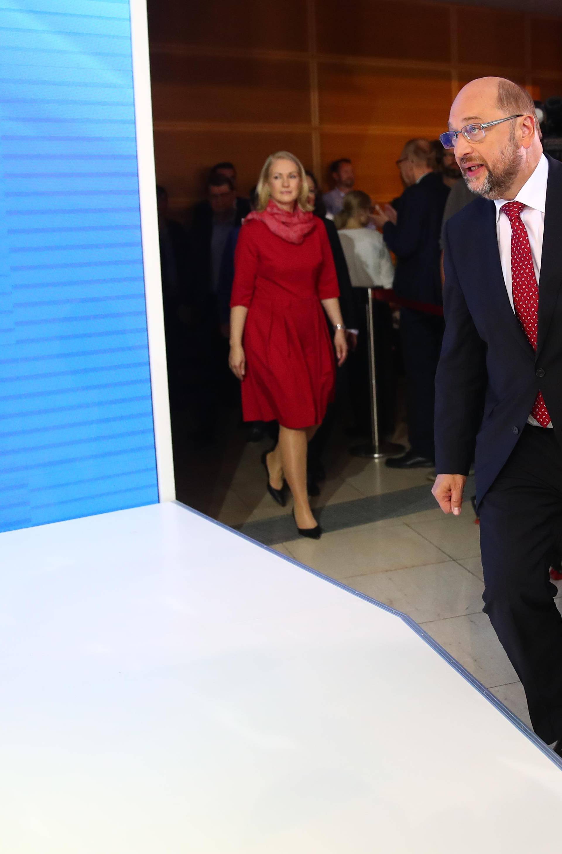 Social Democratic Party leader and top candidate Schulz reacts after first exit polls of the general election