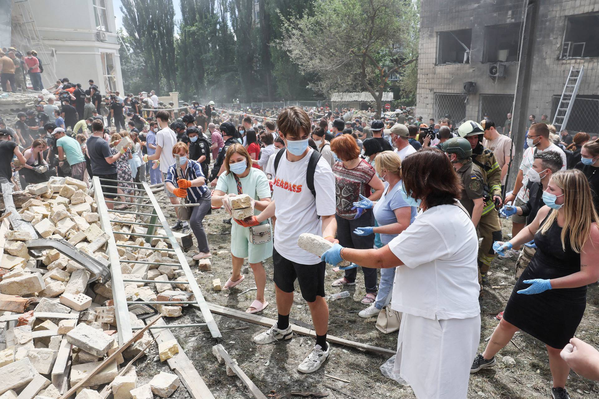 Rescuers work at Ohmatdyt Children's Hospital that was damaged during Russian missile strikes, in Kyiv