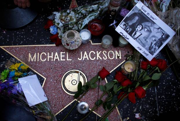 FILE PHOTO: Flowers are placed on the star of Michael Jackson on the Hollywood Walk of Fame in Hollywood