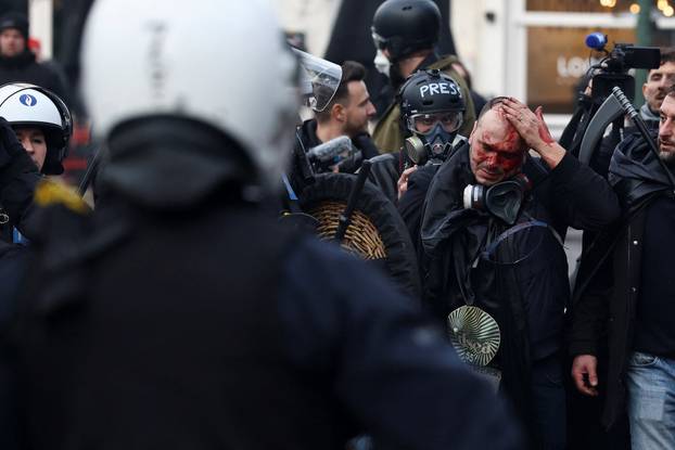 Farmers rally in a large-scale protest in Brussels as leaders meet in EU summit