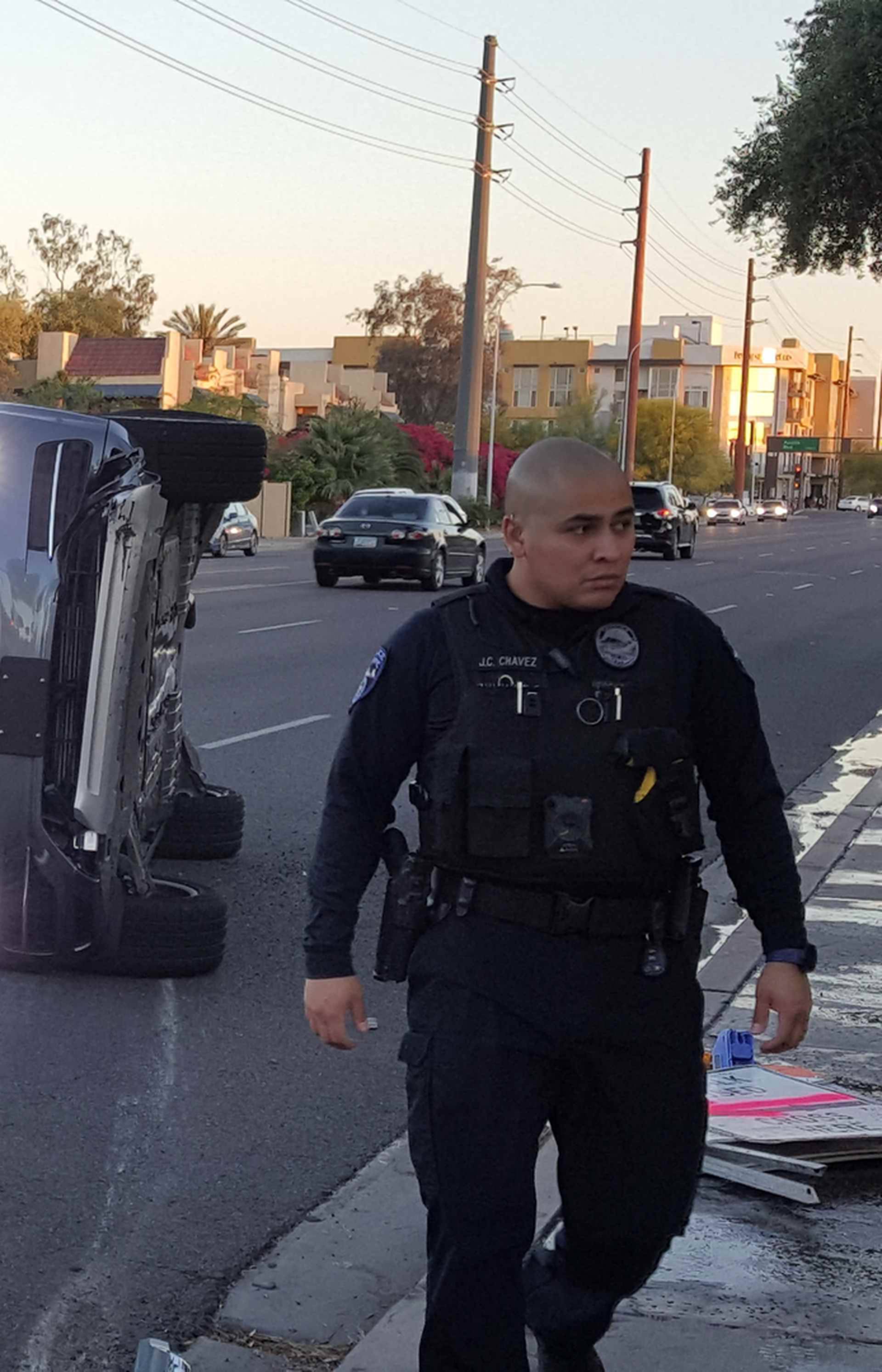 A self-driven Volvo SUV owned and operated by Uber Technologies Inc. is flipped on its side after a collision in Tempe