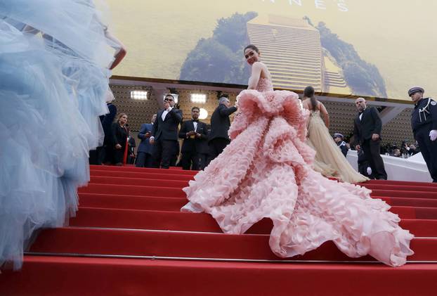 Actress Araya A. Hargate poses as she arrives for the opening ceremony and the screening of the film "Cafe Society" out of competition during the 69th Cannes Film Festival in Cannes