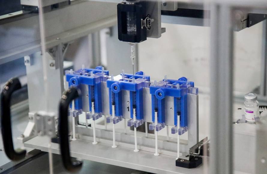 A vaccine extraction machine called AutoVacc, designed by the Chulalongkorn University's Biomedical Engineering Research Center to extract extra doses out of AstraZeneca vaccine vials, is seen in Bangkok