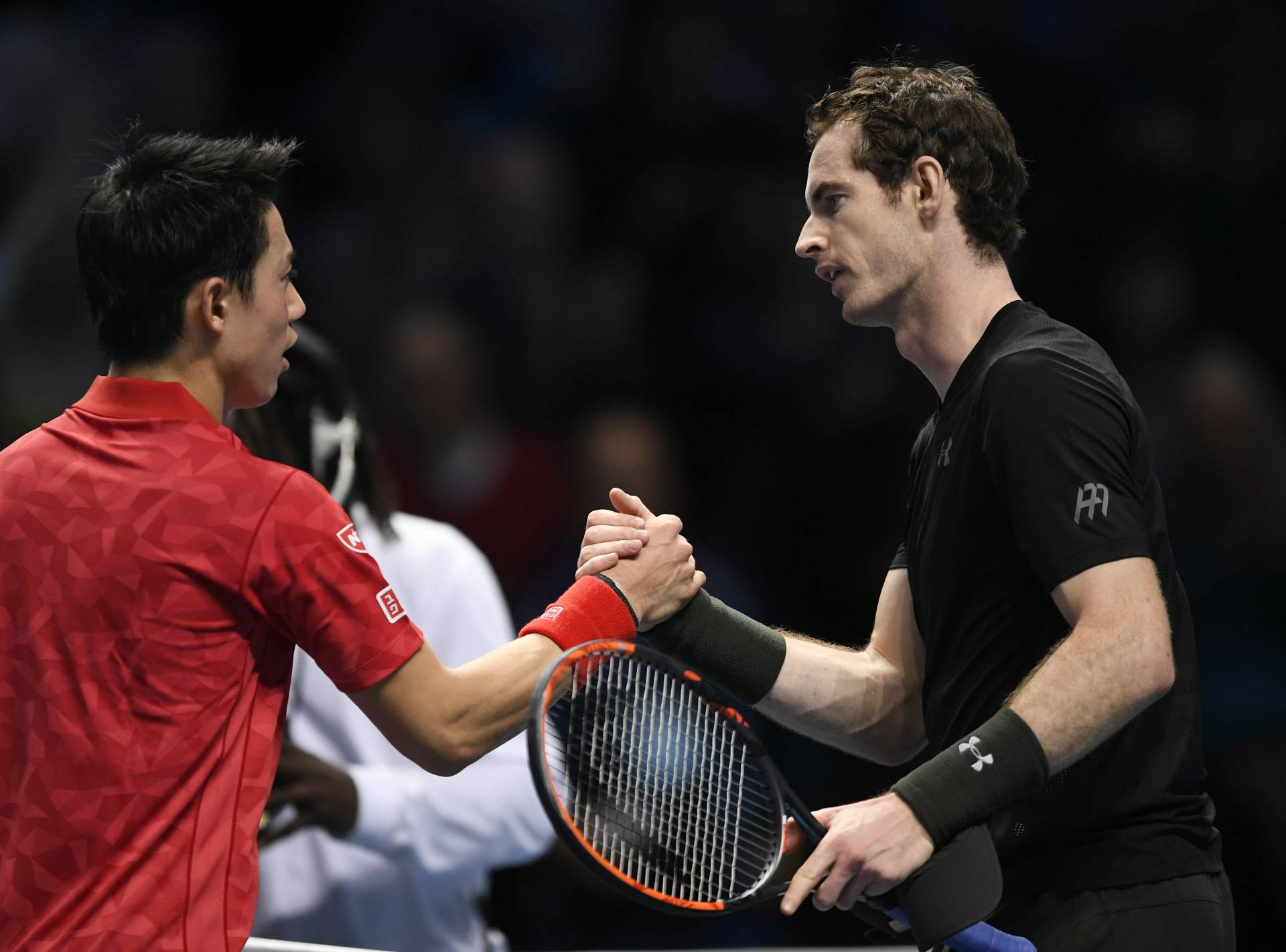 Great Britain's Andy Murray and Japan's Kei Nishikori shake hands after their round robin match