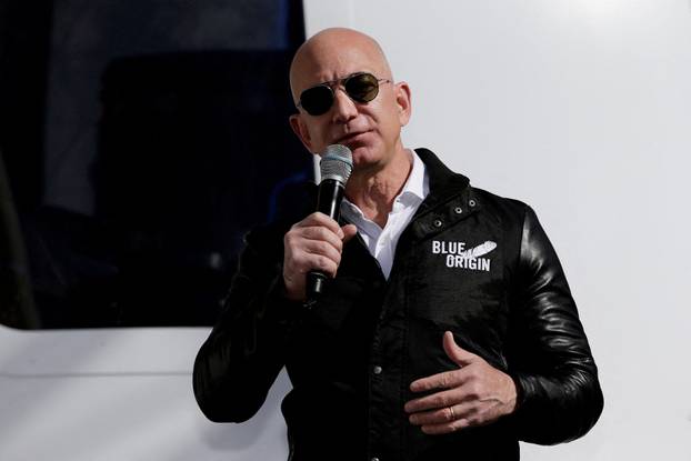 FILE PHOTO: FILE PHOTO: Amazon and Blue Origin founder Jeff Bezos addresses the media about the New Shepard rocket booster and Crew Capsule mockup at the 33rd Space Symposium in Colorado Springs