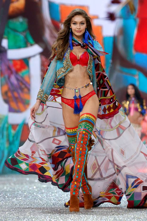 Model Gigi Hadid presents a creation during the 2016 Victoria's Secret Fashion Show at the Grand Palais in Paris