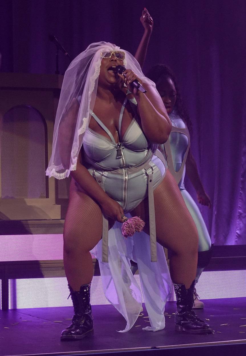 Lizzo puts her curves on display while performing live for a sold out crowd at The Fillmore Miami Beach