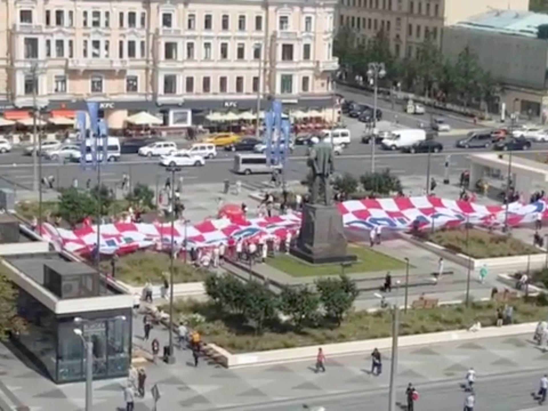 A giant Croatia flag with the inscription "Thank you, Russia" in Russian is seen at Triumfalnaya Square in Moscow