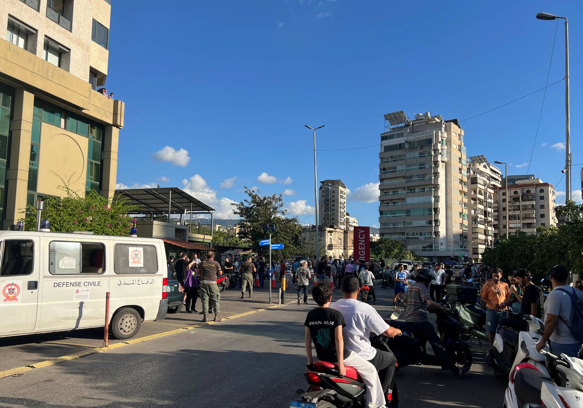 People gather outside Mount Lebanon hospital as more than 1,000 people, including Hezbollah fighters and medics, were wounded on Tuesday when the pagers they use to communicate exploded across Lebanon, according to a security source, in Hazmieh