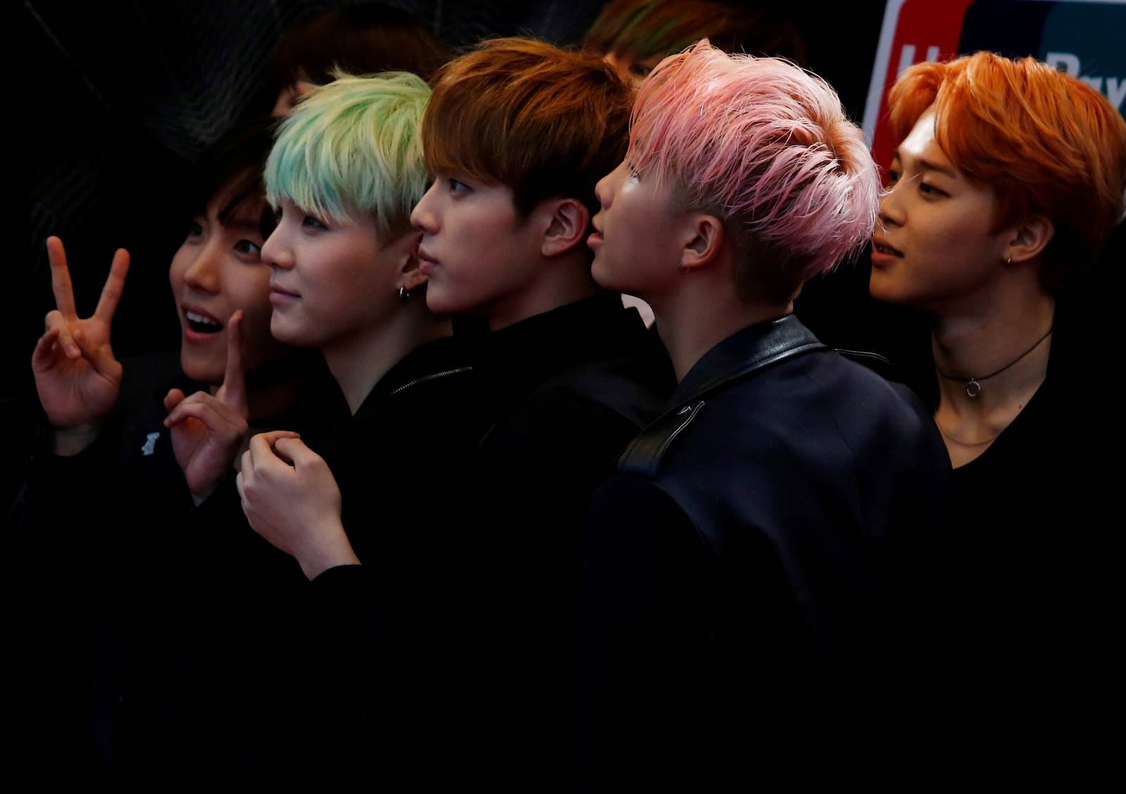 FILE PHOTO: FILE PHOTO: Members of South Korean K-Pop band BTS react on the red carpet during 2015 Mnet Asian Music Awards in Hong Kong