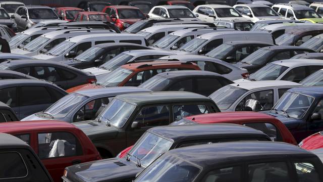 FILE PHOTO: Vehicles, including Lada cars produced by the Russian automobile maker Avtovaz, are parked on the premises of the 'AvtoGermes' dealership in Moscow