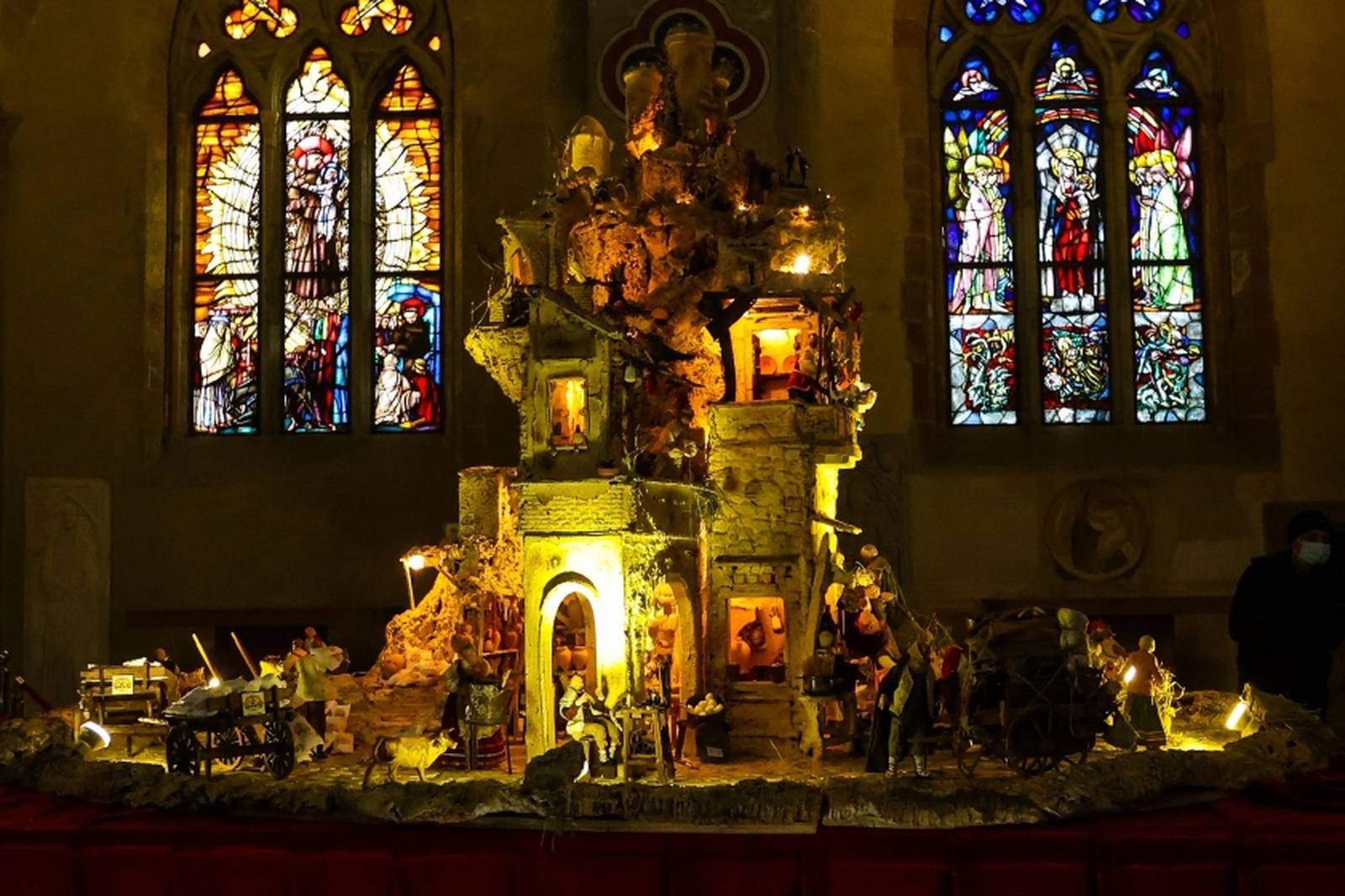 A large nativity scene whose base is also made of pizza to celebrate Christmas in the Basilica of Santa Chiara