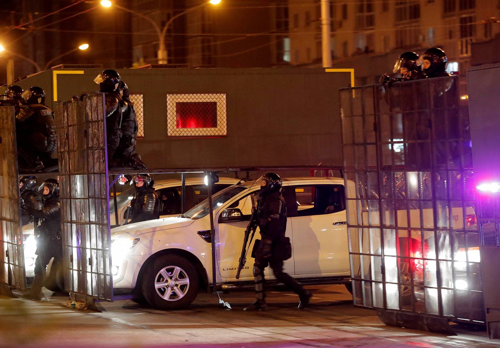 Clashes with opposition supporters after polls closed at the presidential election in Minsk