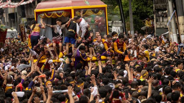 Filipino devotees join the annual Catholic procession of the Black Nazarene