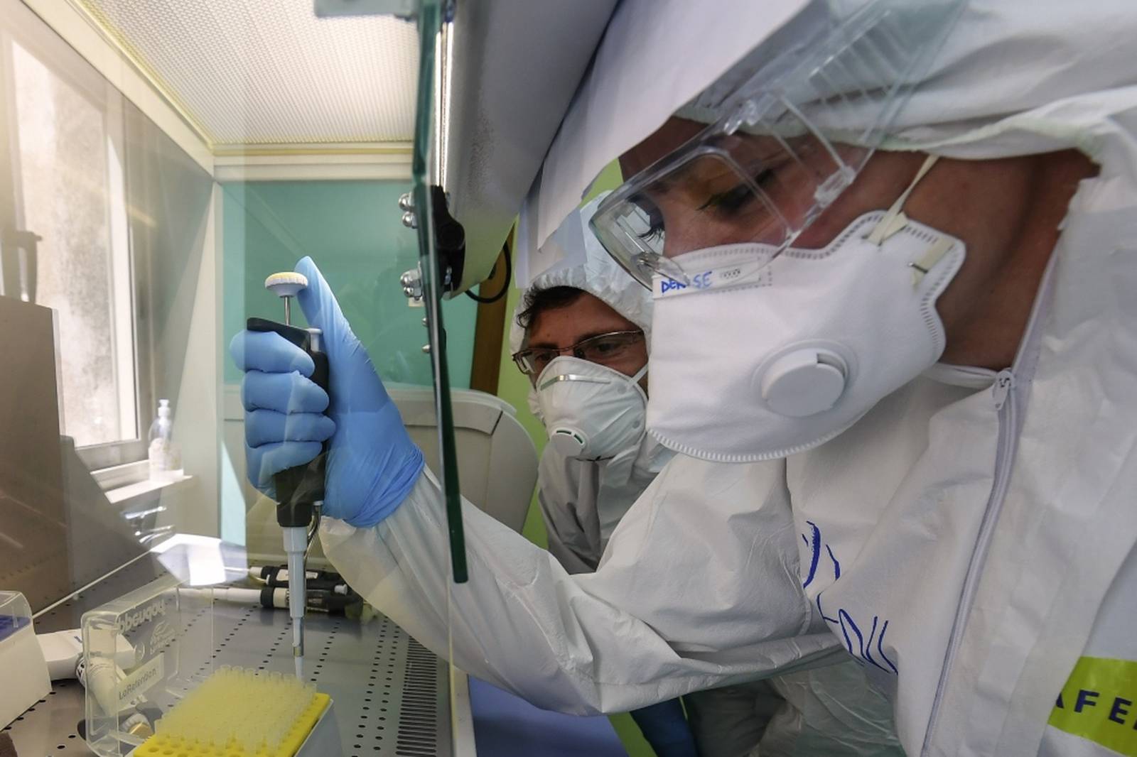 A medical technician works in the laboratory of the Infectious diseases department for coronavirus (COVID-19)