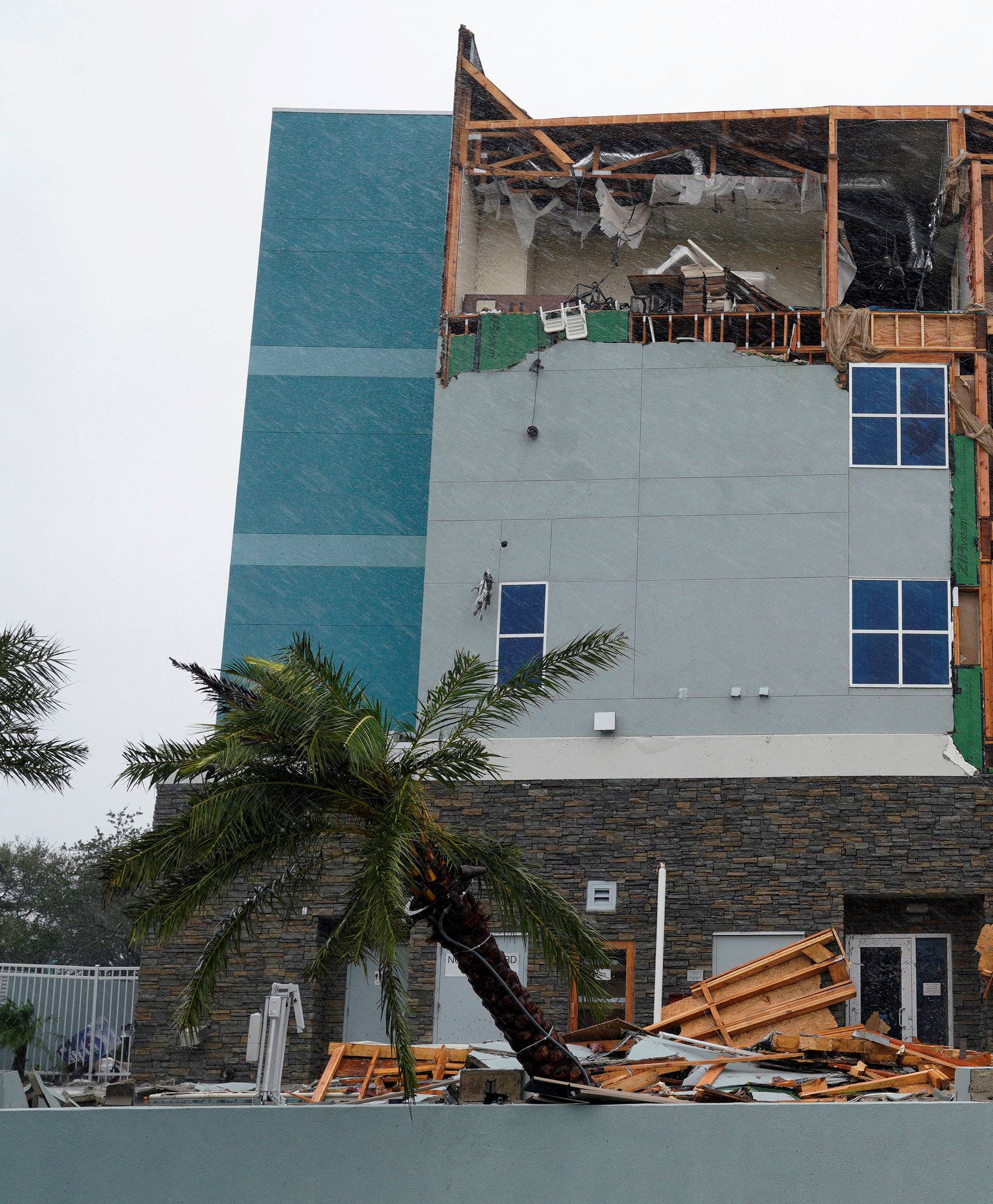 The end wall of the Fairfield Inn is seen partially missing after Hurricane Harvey struck in Rockport