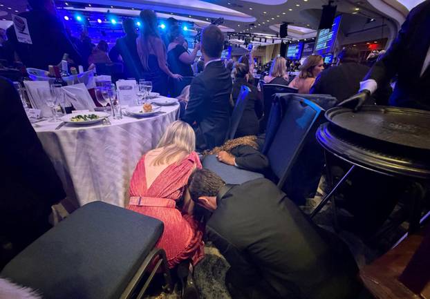 U.S. President Donald Trump and first lady Melania Trump rushed out of the White House Correspondents' Association dinner