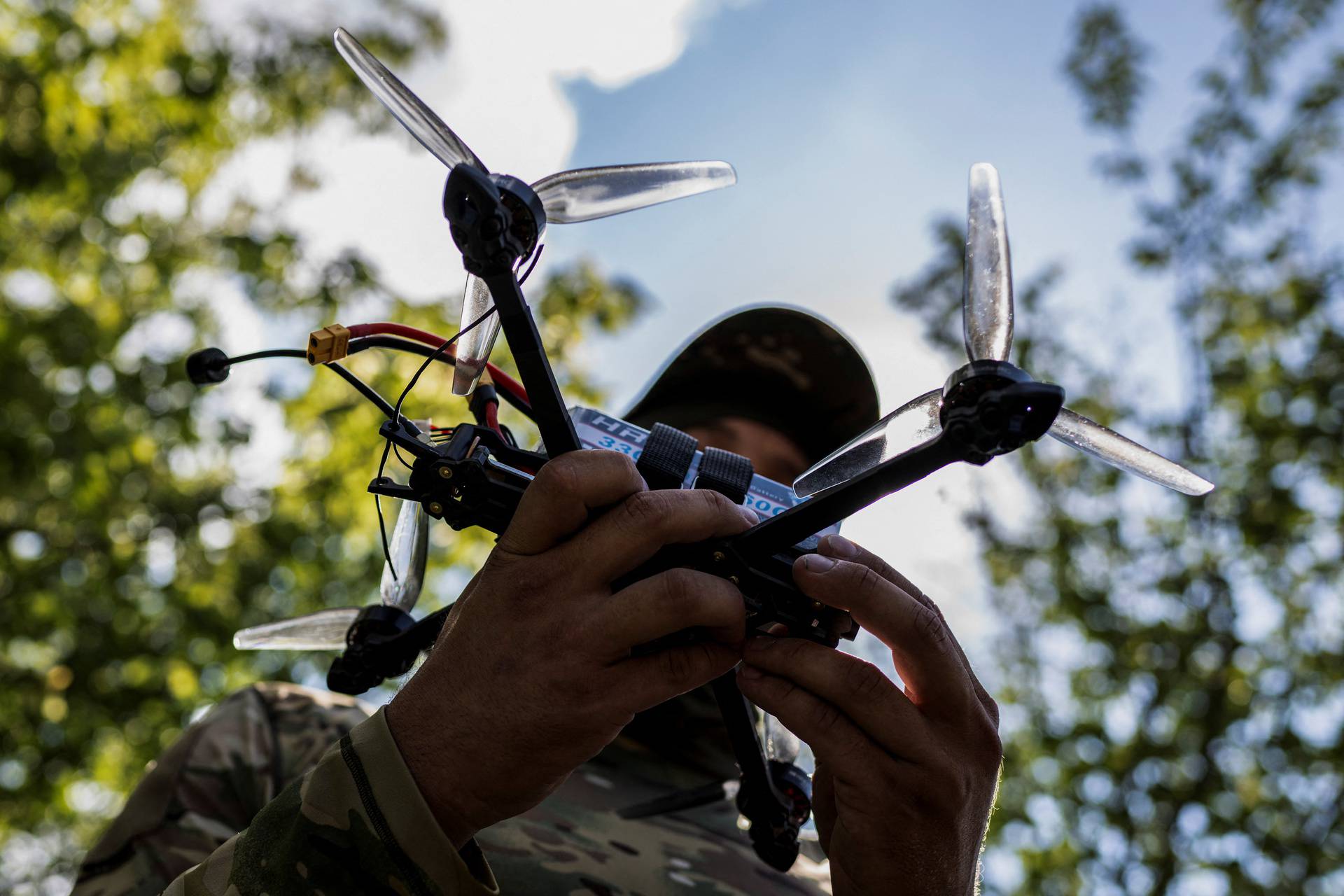 Ukrainian servicemen attend a training to use drones in Zaporizhzhia region