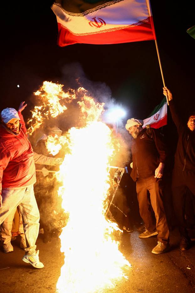 People gather after a two-week ceasefire in the Iran war was announced, in Tehran