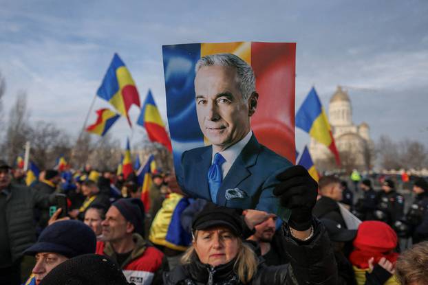 Supporters of Calin Georgescu demonstrate outside the constitutional court