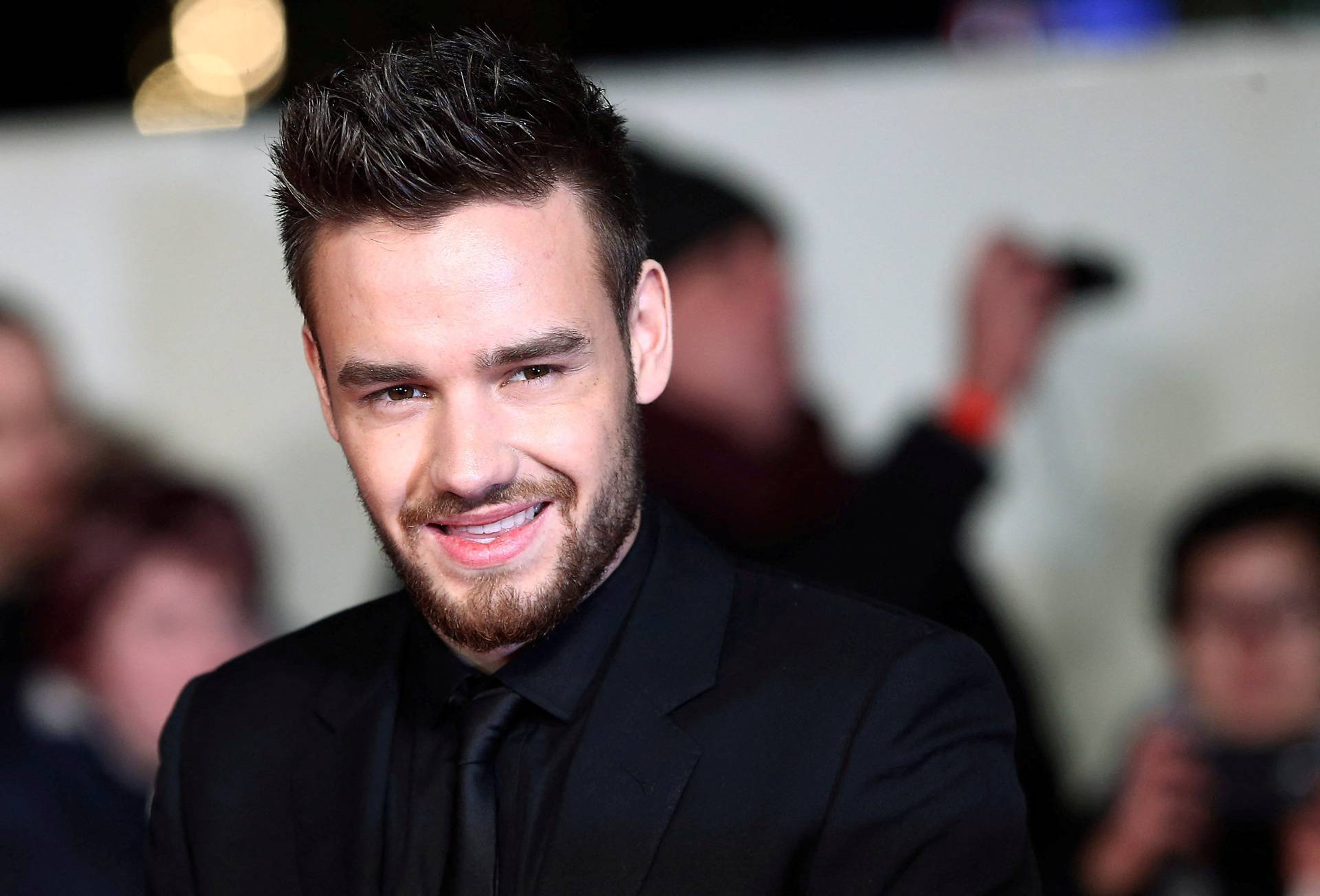 FILE PHOTO: Singer Liam Payne poses for photographers at the world premiere of the film "I am Bolt" in London