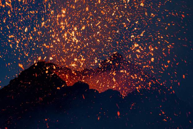 Italy's Mount Etna erupts