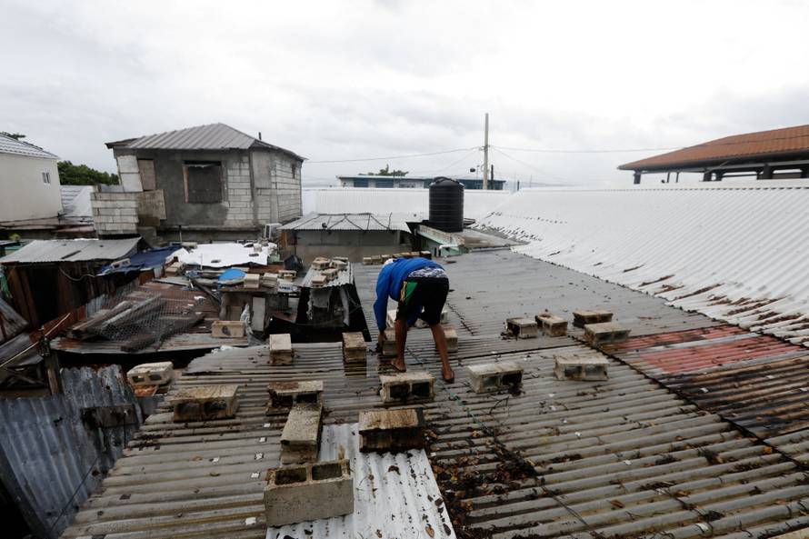 Jamaicans make preparations ahead of the arrival of Hurricane Melissa