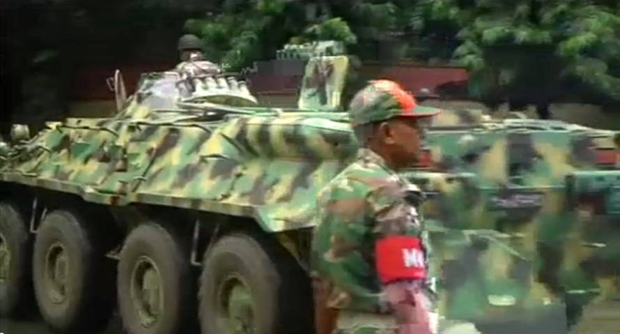 Still frame taken from video shows an army armoured vehicle moving along a street as police stormed the Holey Artisan restaurant after gunmen attacked it and took hostages early on Saturday in Dhaka