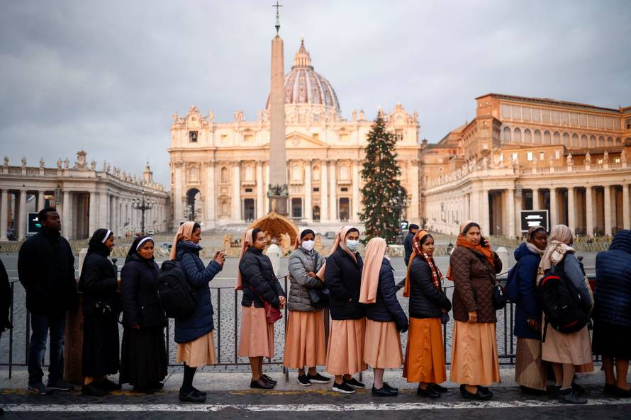 Faithful pay homage to former Pope Benedict in St. Peter's Basilica at the Vatican