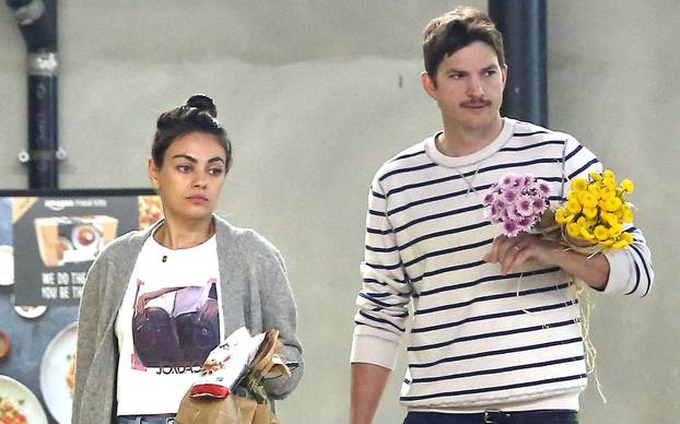 EXCLUSIVE: Mila Kunis and Ashton Kutcher out in Los Angeles buying some flowers