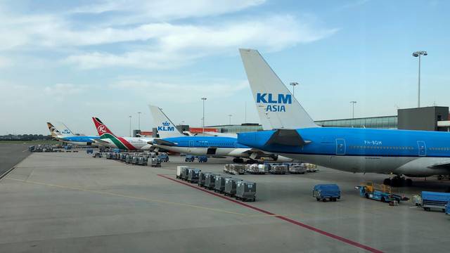 FILE PHOTO: Aircrafts are seen on the tarmac at Amsterdam Schiphol airport