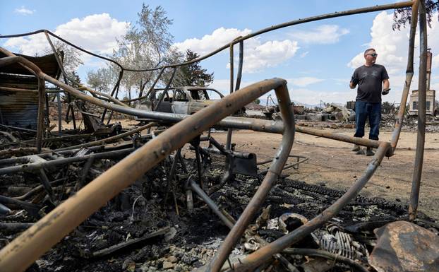 Luke Opperman at his burned home at Hawk Fire in Reno